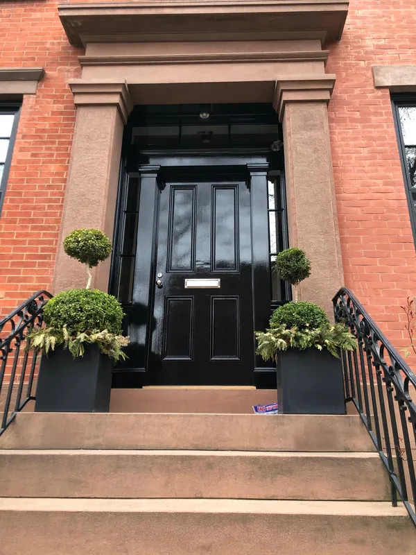 Finished brownstone entry and stoop by MMSL Contracting Corp