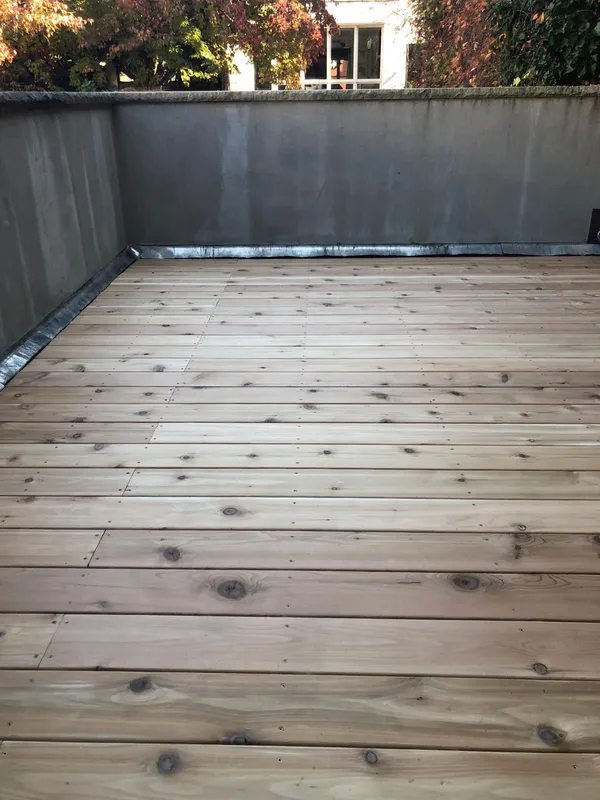 Newly built cedar deck by MMSL Contracting Corp