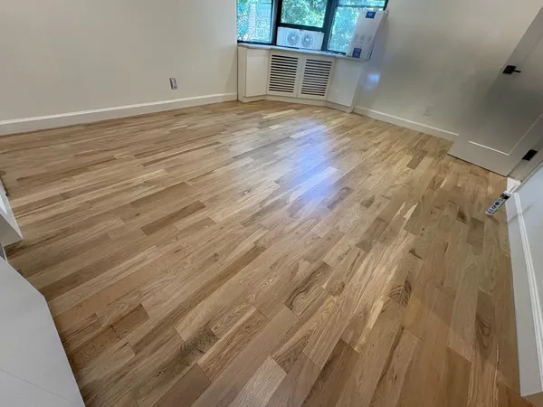 Newly installed hardwood floor by MMSL Contracting Corp
